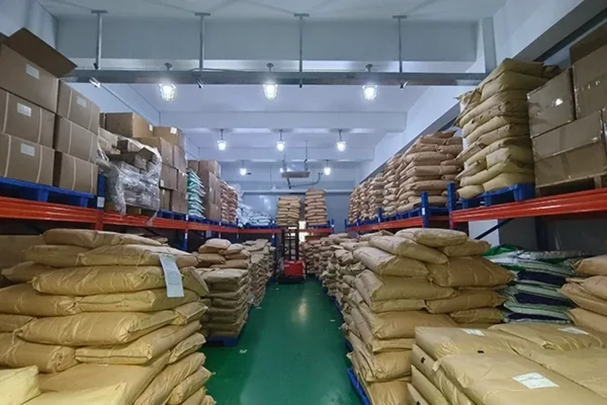 Same-site warehouse with identified ingredient sacks and cartons arranged on storage racks
