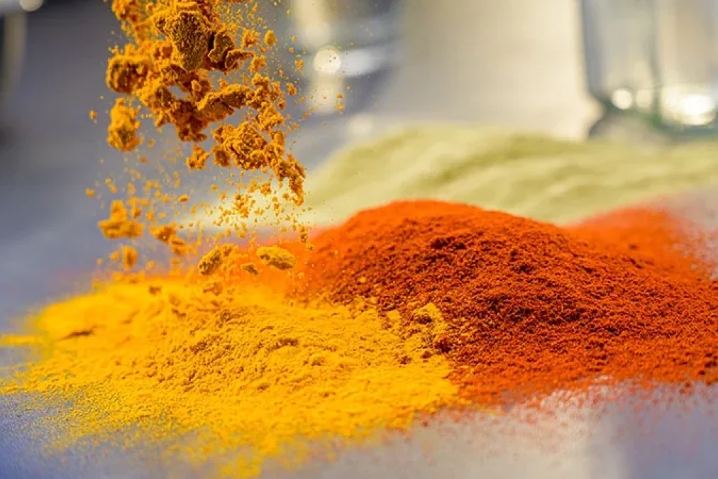 Protein powder samples arranged for formula and packaging comparison